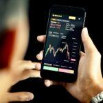 person holding black android smartphone