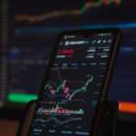 black android smartphone on brown wooden table